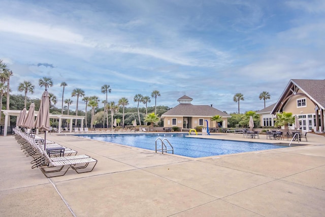 view of swimming pool featuring a patio