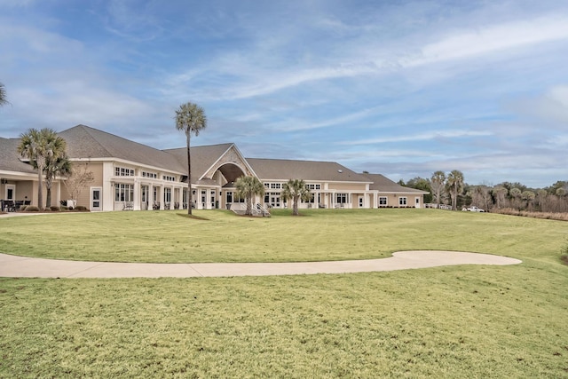 view of home's community featuring a lawn