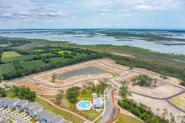 birds eye view of property with a residential view and a water view