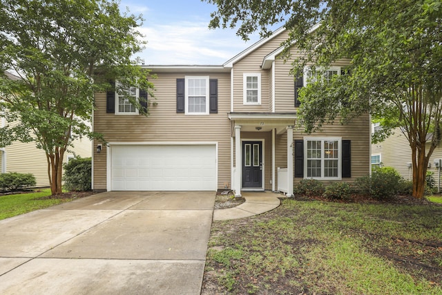 72 Shadow Moss Dr, Beaufort, SC 29906 - traditional-style house with a garage and concrete driveway