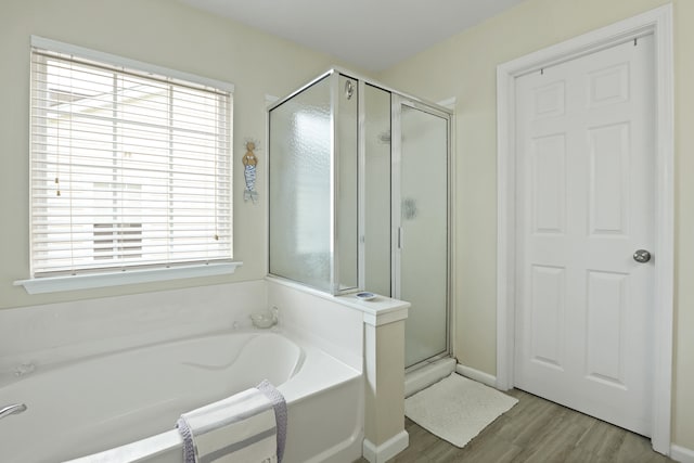 72 Shadow Moss Dr, Beaufort, SC 29906 - full bath featuring a shower stall, a garden tub, and wood finished floors