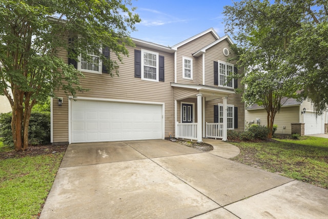 72 Shadow Moss Dr, Beaufort, SC 29906 - traditional home with a garage, covered porch, and driveway