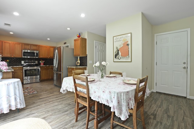 72 Shadow Moss Dr, Beaufort, SC 29906 - dining area featuring wood finished floors and recessed lighting