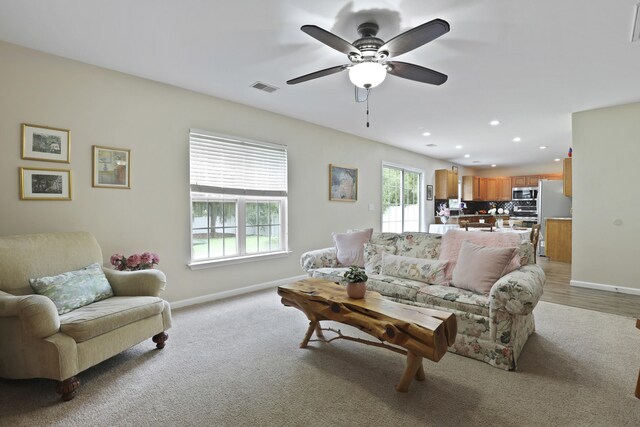 72 Shadow Moss Dr, Beaufort, SC 29906 - living room featuring light carpet, recessed lighting, and a ceiling fan