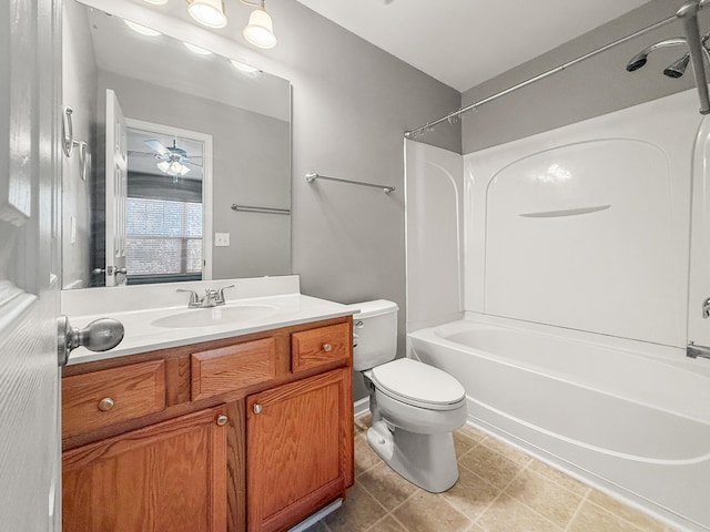 full bathroom featuring tile patterned floors, toilet, vanity, ceiling fan, and bathtub / shower combination