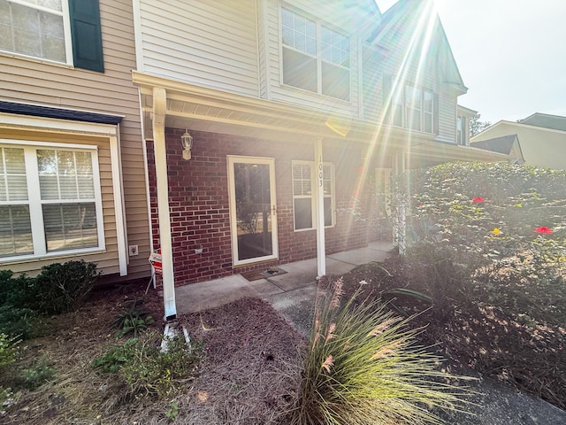 entrance to property with a patio area