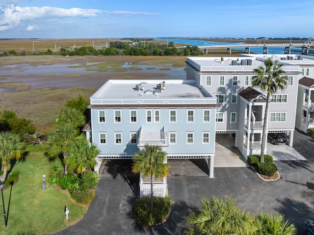 drone / aerial view with a water view