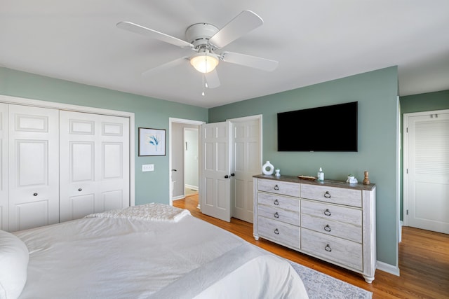 bedroom featuring light hardwood / wood-style floors and ceiling fan