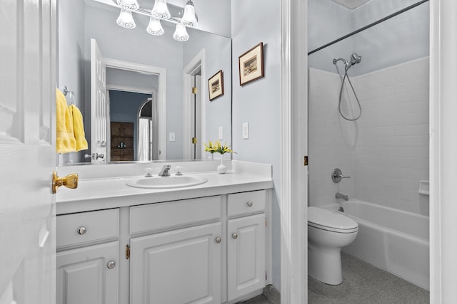 bathroom featuring tub / shower combination, toilet, and vanity