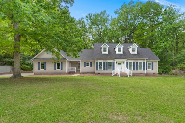 cape cod house with a front yard