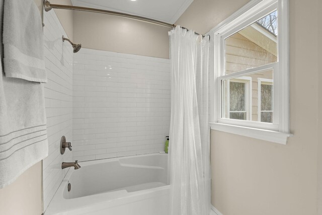 bathroom with shower / tub combo