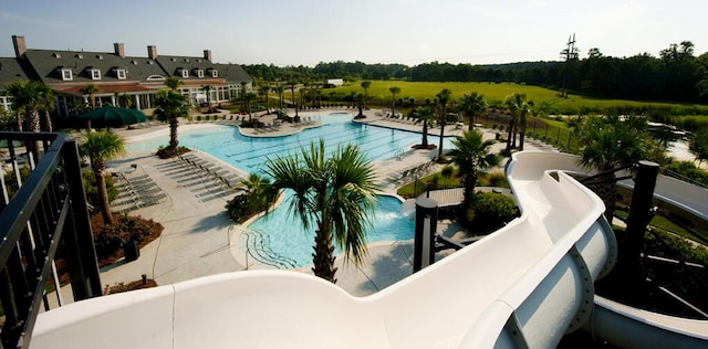 community pool featuring a patio area