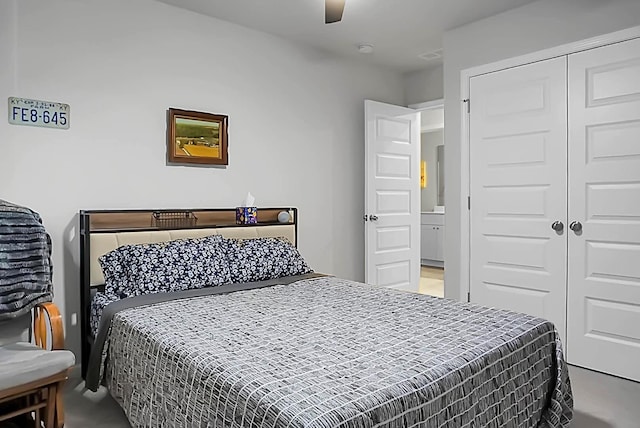 bedroom with a ceiling fan and a closet