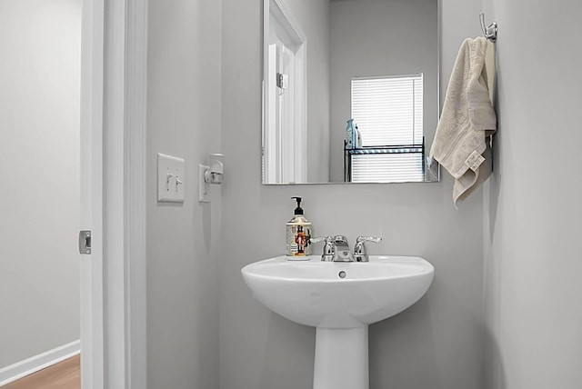 bathroom featuring baseboards