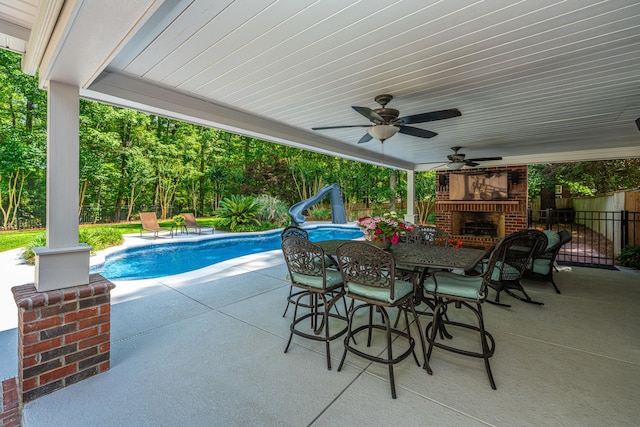 69 King Charles Cir, Summerville, SC 29485 - view of patio / terrace with an outdoor brick fireplace and ceiling fan