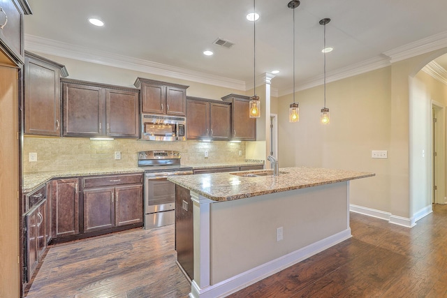 271 Village Stone Cir, Summerville, SC 29486 - kitchen with stainless steel appliances, light stone countertops, dark wood-style floors, an island with sink, and decorative backsplash