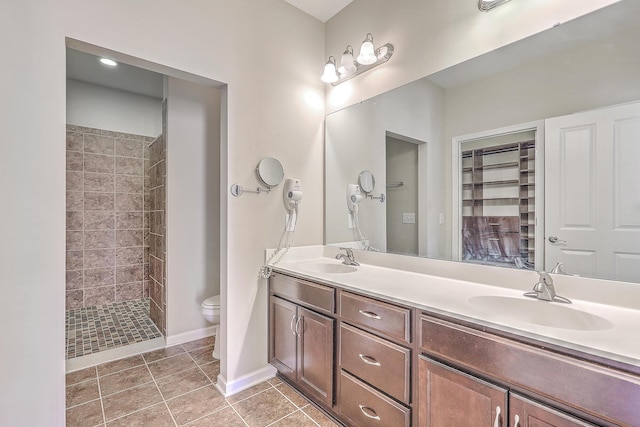 271 Village Stone Cir, Summerville, SC 29486 - bathroom featuring double vanity, tiled shower, and tile patterned floors