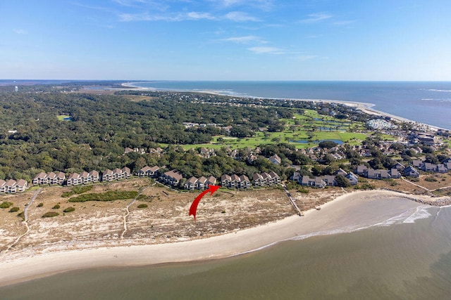 bird's eye view with a water view and a view of the beach