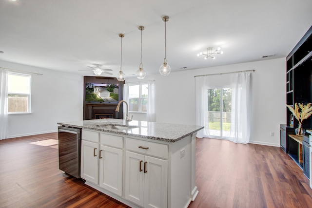 596 Wayton Cir, Moncks Corner, SC 29461 - kitchen with a sink, stainless steel dishwasher, healthy amount of natural light, and dark wood-style flooring