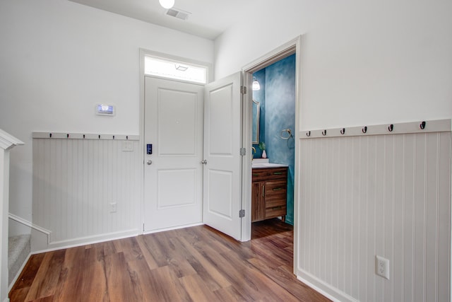 596 Wayton Cir, Moncks Corner, SC 29461 - entrance foyer featuring wood finished floors and wainscoting