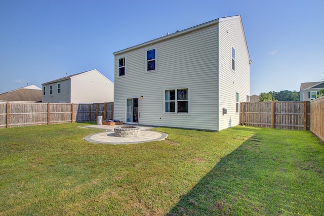 596 Wayton Cir, Moncks Corner, SC 29461 - rear view of house with an outdoor fire pit and a patio