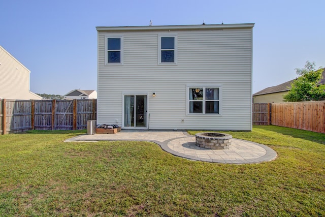 596 Wayton Cir, Moncks Corner, SC 29461 - back of property featuring a patio area and an outdoor fire pit
