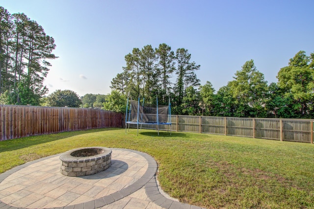596 Wayton Cir, Moncks Corner, SC 29461 - view of yard with a fire pit and a trampoline