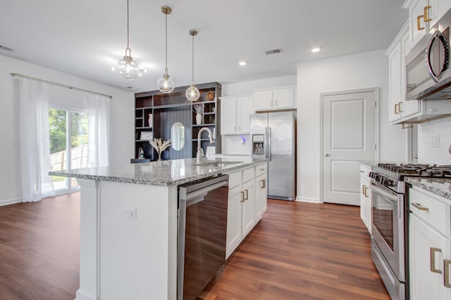 596 Wayton Cir, Moncks Corner, SC 29461 - kitchen with stainless steel appliances, a sink, dark wood-style flooring, white cabinetry, and recessed lighting
