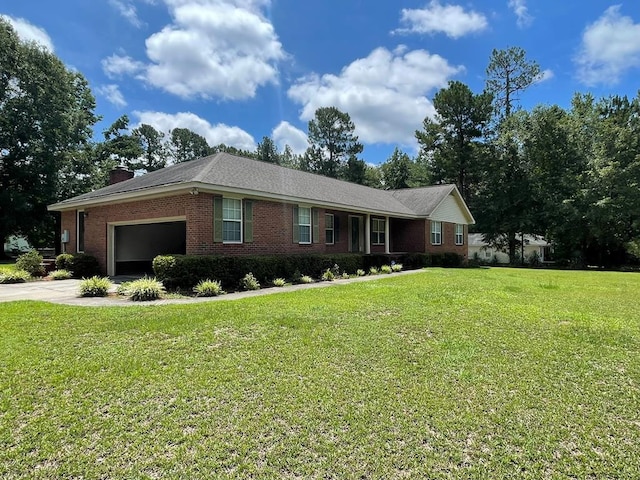 ranch-style house with a garage and a front lawn