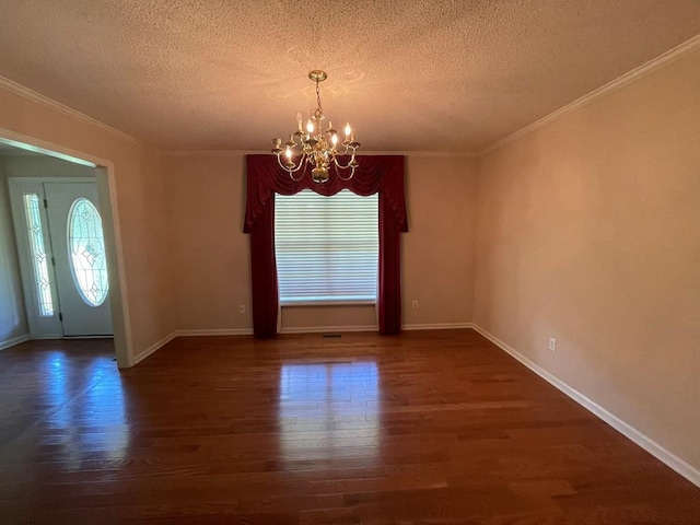 interior space featuring a healthy amount of sunlight, an inviting chandelier, and dark hardwood / wood-style floors