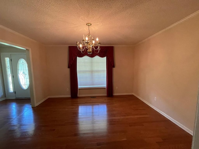 interior space with crown molding, dark wood-type flooring, an inviting chandelier, and a textured ceiling