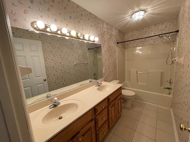 full bathroom featuring shower / bath combination, toilet, tile patterned floors, vanity, and a textured ceiling