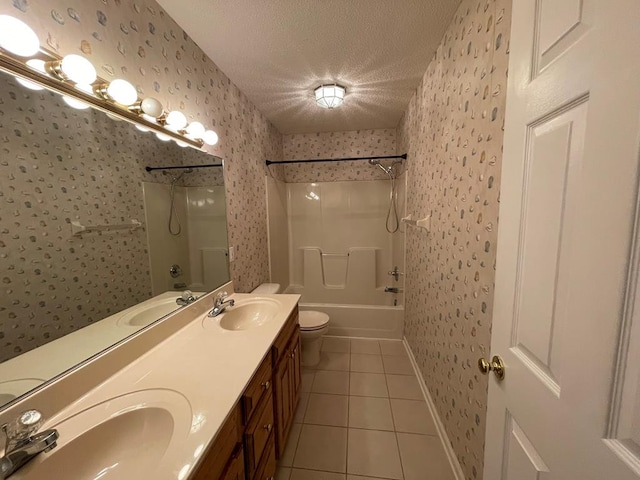 full bathroom featuring vanity, tile patterned flooring, shower / bath combination, toilet, and a textured ceiling