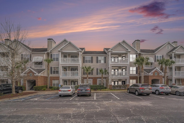 view of outdoor building at dusk