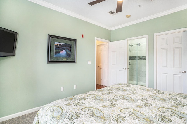 carpeted bedroom featuring crown molding, ceiling fan, and ensuite bath