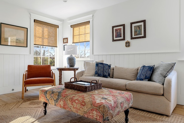 95 Line St, Charleston, SC 29403 - living area featuring a wainscoted wall and wood finished floors