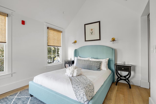 95 Line St, Charleston, SC 29403 - bedroom featuring lofted ceiling, baseboards, and wood finished floors