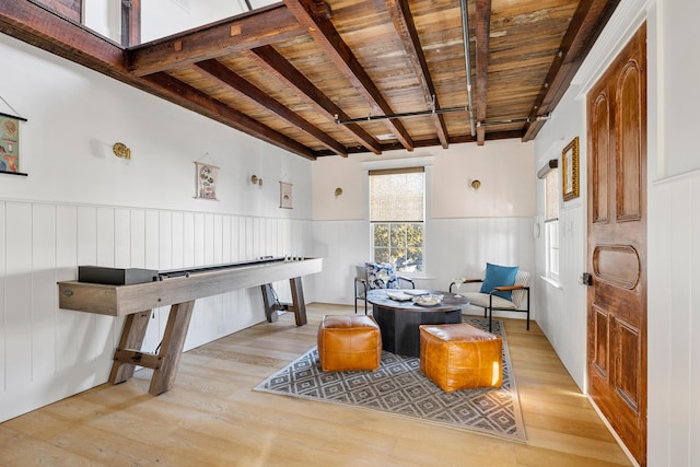 95 Line St, Charleston, SC 29403 - living area with a wainscoted wall, wood ceiling, wood finished floors, and beamed ceiling
