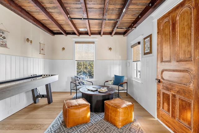 95 Line St, Charleston, SC 29403 - sitting room featuring a wainscoted wall, beam ceiling, light wood-style flooring, and wood ceiling