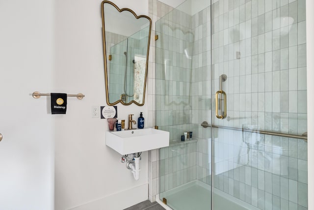 95 Line St, Charleston, SC 29403 - bathroom featuring a tile shower and a sink