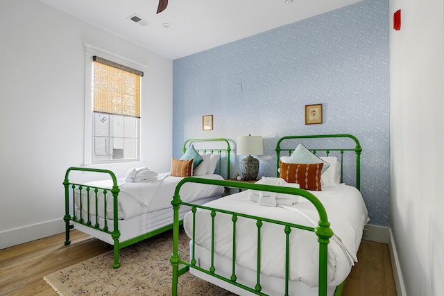 95 Line St, Charleston, SC 29403 - bedroom featuring visible vents, baseboards, and wood finished floors