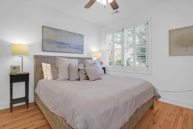 bedroom featuring ceiling fan and wood-type flooring