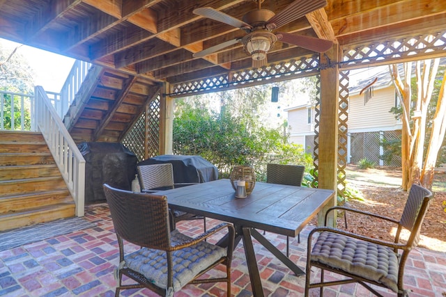 view of patio / terrace featuring area for grilling and ceiling fan