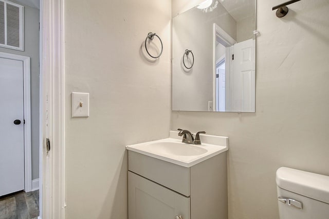 1554 Orange Grove Rd Unit A & B, Charleston, SC 29407 - half bathroom featuring vanity, toilet, and wood finished floors
