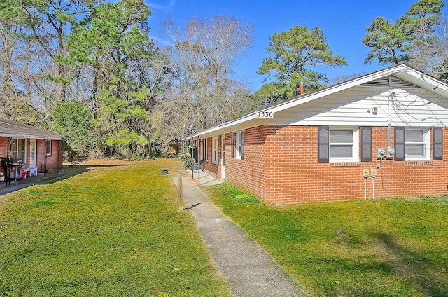 1554 Orange Grove Rd Unit A & B, Charleston, SC 29407 - view of side of property featuring a yard and brick siding