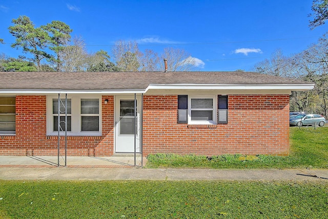 1554 Orange Grove Rd Unit A & B, Charleston, SC 29407 - single story home featuring brick siding, a patio, and a front yard