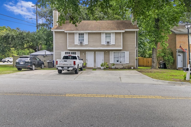 901 Sea Gull Dr Unit A & B, Mount Pleasant, SC 29464 - townhome / multi-family property with a chimney and uncovered parking