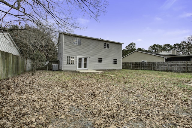 rear view of house with a patio and french doors