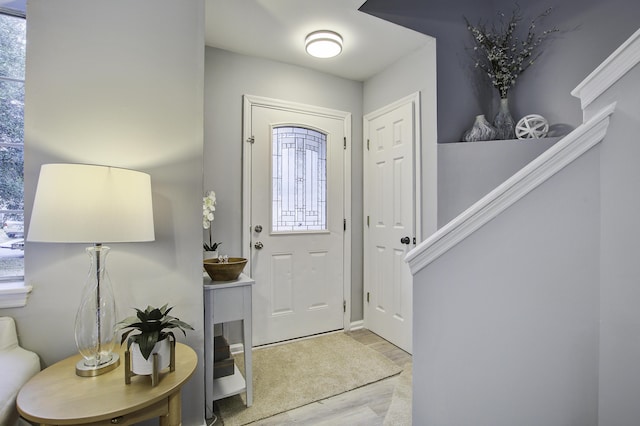 foyer with light hardwood / wood-style floors