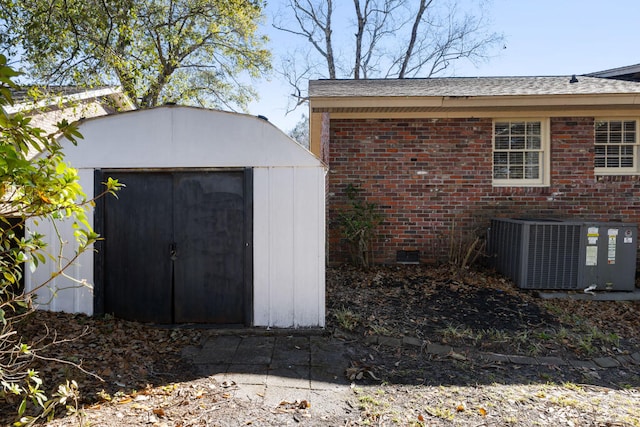 view of shed with central AC unit